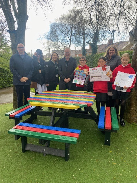 Pictured are members of the Trelleborg team along with the winners of a recent competition they ran, which promoted the idea of travelling more sustainably to and from school. Included in the photo is the large donated picnic table.